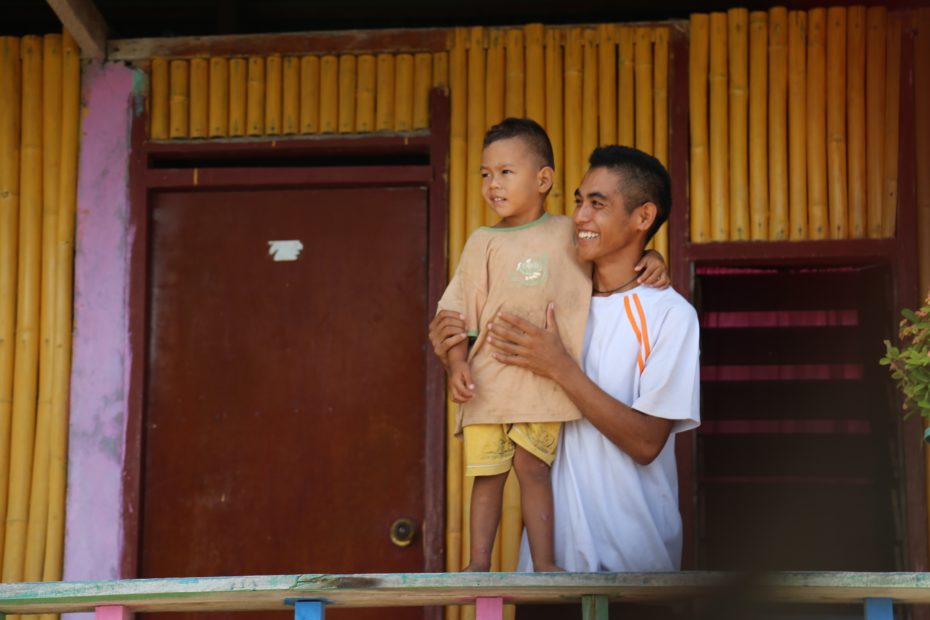 Father and son in Com, Timor-Leste. 